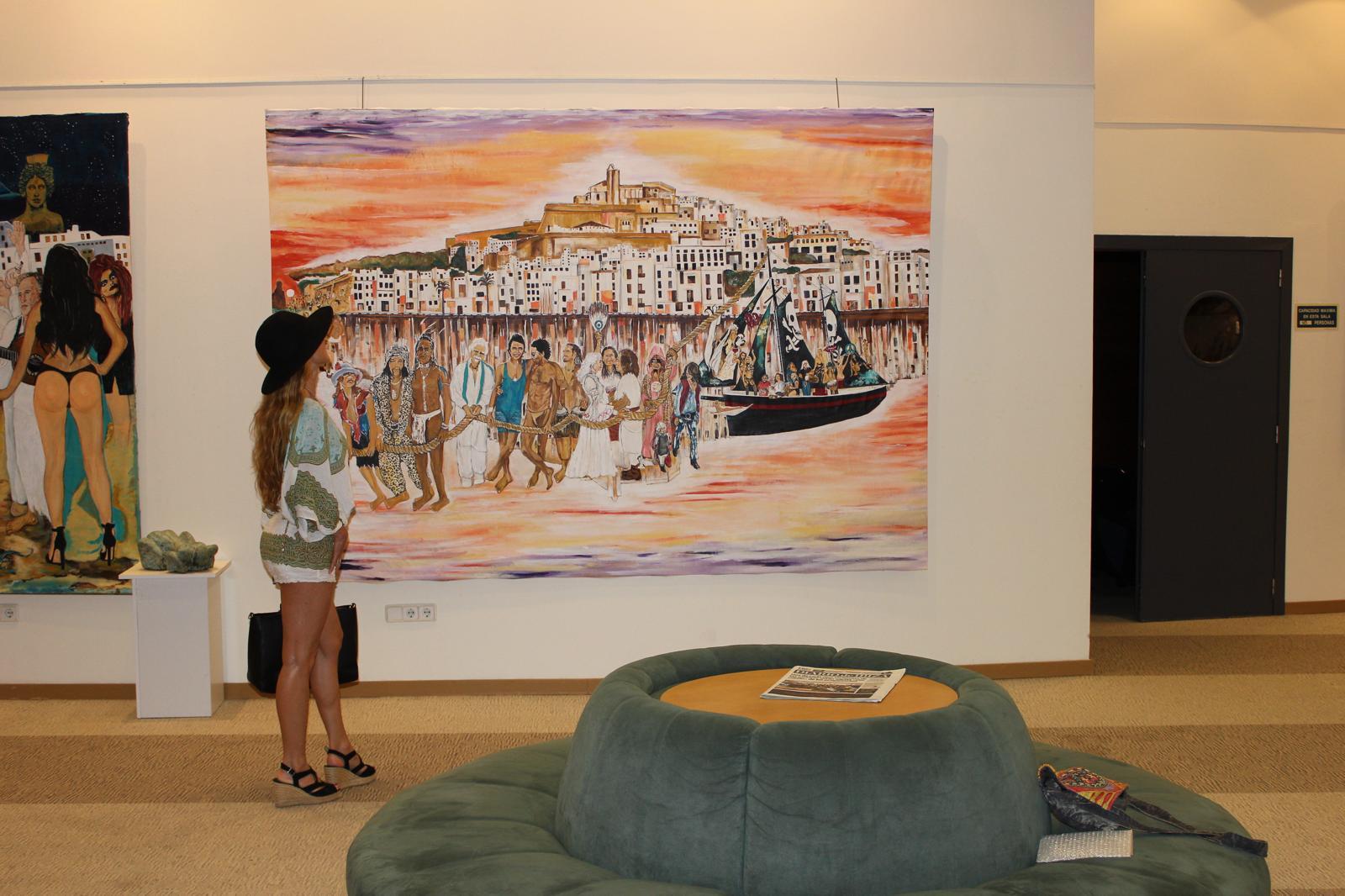 Hippies hung in San Juan Galeria, Ibiza, a visitor looking up at the 2 × 3 metre canvas